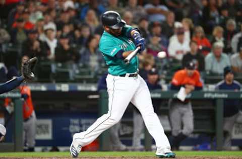 SEATTLE, WASHINGTON – JUNE 06: Edwin Encarnacion #10 of the Seattle Mariners hits an RBI single to score Dylan Moore #25 of the Seattle Mariners to tie the game 6-6 in the ninth inning against the Houston Astros during their game at T-Mobile Park on June 06, 2019 in Seattle, Washington. (Photo by Abbie Parr/Getty Images)