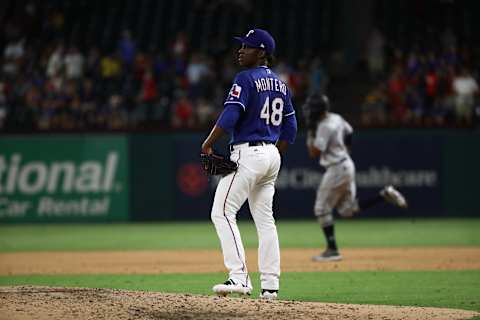 ARLINGTON, TEXAS – JULY 31: Rafael Montero #48 of the Texas Rangers steps off the mound after giving up a two-run homerun against Keon Broxton #4 of the Seattle Mariners in the eighth inning at Globe Life Park in Arlington on July 31, 2019 in Arlington, Texas. (Photo by Ronald Martinez/Getty Images)