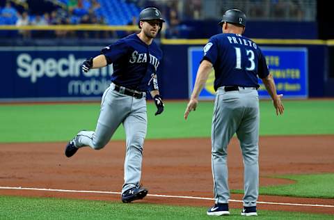 ST PETERSBURG, FLORIDA – AUGUST 19: Tom Murphy #2 of the Seattle Mariners is congratulated after hitting a three run home run in the first inning during a game at Tropicana Field on August 19, 2019 in St Petersburg, Florida. (Photo by Mike Ehrmann/Getty Images)