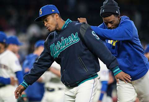 SEATTLE, WA – SEPTEMBER 29: Mallex Smith #0 of the Seattle Mariners and teammate Dee Gordon #9 celebrate after a game against the Oakland Athletics at T-Mobile Park on September 29, 2019 in Seattle, Washington. The Mariners won 3-1. (Photo by Stephen Brashear/Getty Images)