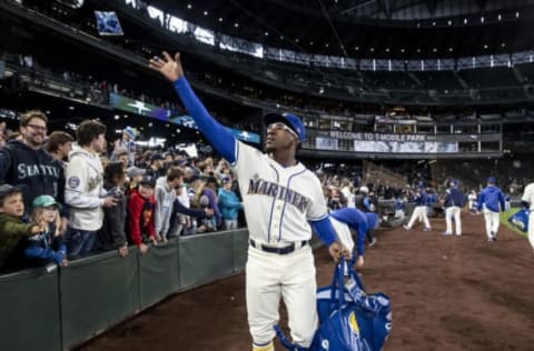 SEATTLE, WA – SEPTEMBER 29: Shed Long #39 of the Seattle Mariners hands out memorabilia after a game against the Oakland Athletics to end the season at T-Mobile Park on September 29, 2019, in Seattle, Washington. The Mariners won 3-1. (Photo by Stephen Brashear/Getty Images)