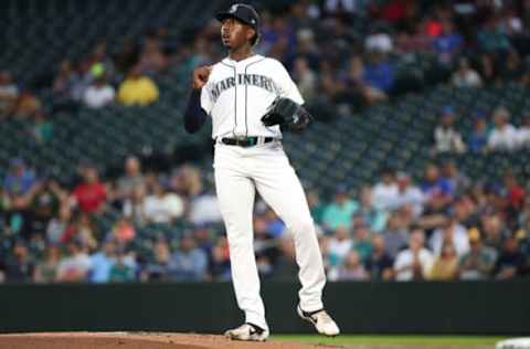 SEATTLE, WASHINGTON – SEPTEMBER 12: Justin Dunn #35 of the Seattle Mariners reacts after giving up a walk during his MLB debut in the first inning against the Cincinnati Reds during their game at T-Mobile Park on September 12, 2019, in Seattle, Washington. (Photo by Abbie Parr/Getty Images)