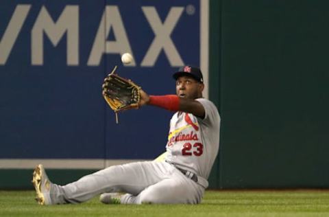 WASHINGTON, DC – OCTOBER 14: Marcell Ozuna #23 of the St. Louis Cardinals attempts to make the catch on an RBI double by Anthony Rendon #6 of the Washington Nationals in the third inning of game three of the National League Championship Series at Nationals Park on October 14, 2019, in Washington, DC. (Photo by Patrick Smith/Getty Images)