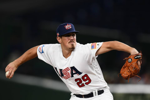 Parker Dunshee of the Athletics throws for Team USA. He is Rule 5 eligible. (Photo by CHARLY TRIBALLEAU / AFP) (Photo by CHARLY TRIBALLEAU/AFP via Getty Images)