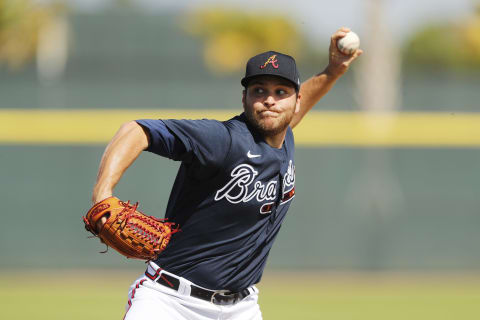 SARASOTA, FLORIDA – FEBRUARY 20: Thomas Burrows of the Braves throws during a team workout. He is Rule 5 Draft eligible. (Photo by Michael Reaves/Getty Images)