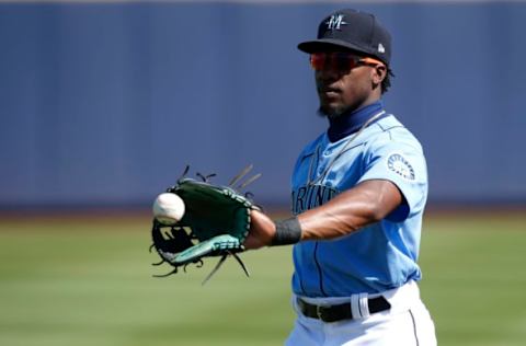 PEORIA, ARIZONA – MARCH 05: Shed Long Jr #4 of the Seattle Mariners catches a ball during warm-up prior to a Cactus League spring training baseball game against the San Diego Padres at Peoria Stadium on March 05, 2020, in Peoria, Arizona. (Photo by Ralph Freso/Getty Images)