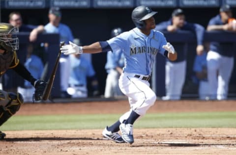 PEORIA, ARIZONA – MARCH 05: Mallex Smith #0 of the Seattle Mariners hits a ground ball during the first inning of a Cactus League spring training baseball game against the San Diego Padres at Peoria Stadium on March 05, 2020, in Peoria, Arizona. (Photo by Ralph Freso/Getty Images)