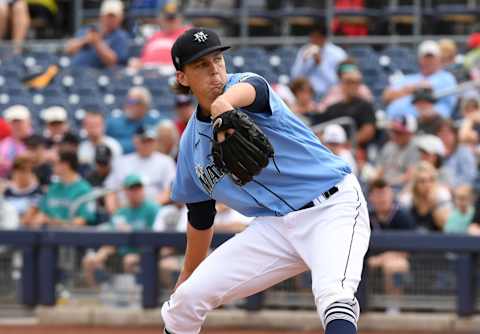 PEORIA, ARIZONA – MARCH 10:  Logan Gilbert of the Seattle Mariners delivers a pitch during a spring training game. Avengers. (Photo by Norm Hall/Getty Images)