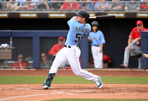 PEORIA, ARIZONA – MARCH 10: Jarred Kelenic #58 of the Seattle Mariners follows through on a swing against the Los Angeles Angels during a spring training game at Peoria Stadium on March 10, 2020 in Peoria, Arizona. (Photo by Norm Hall/Getty Images)