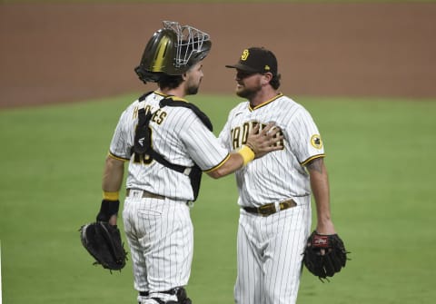 SAN DIEGO, CA – AUGUST 7: Kirby Yates of the San Diego Padres is congratulated by Austin Hedges. (Photo by Denis Poroy/Getty Images)