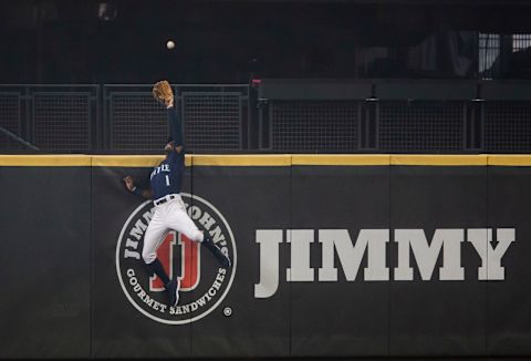 SEATTLE, WA – SEPTEMBER 14: Kyle Lewis #1 of the Seattle Mariners robs Ramon Laureano #22 of the Oakland Athletics of a home run during the first inning in the second game of a doubleheader at T-Mobile Park on September 14, 2020 in Seattle, Washington. (Photo by Lindsey Wasson/Getty Images)