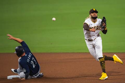 SAN DIEGO, CA – SEPTEMBER 18: Fernando Tatis Jr of the Padres turns a double play against the Mariners. (Photo by Matt Thomas/San Diego Padres/Getty Images)