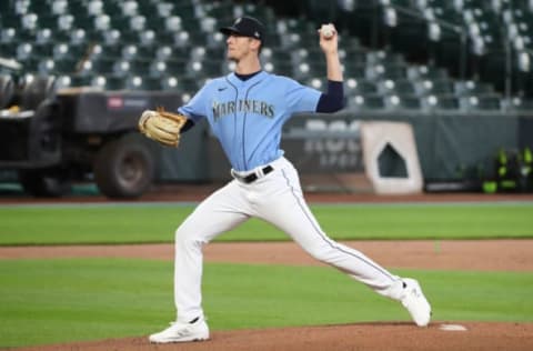 SEATTLE, WASHINGTON – JULY 07: Brandon Williamson #60, a Seattle Mariners prospect throws the ball during summer workouts. (Photo by Abbie Parr/Getty Images)