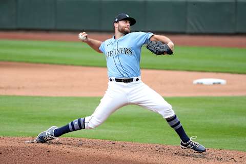 SEATTLE, WASHINGTON – JULY 07: Sam Delaplane #77 of the Seattle Mariners pitches during summer workouts at T-Mobile Park on July 07, 2020 in Seattle, Washington. (Photo by Abbie Parr/Getty Images)