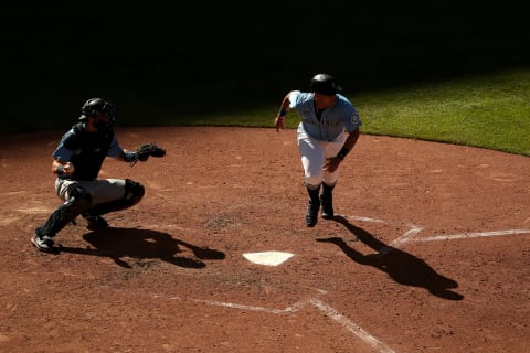 SEATTLE, WASHINGTON – JULY 13: Julio Rodriguez of the Seattle Mariners runs out of the batter’s box. (Photo by Abbie Parr/Getty Images)