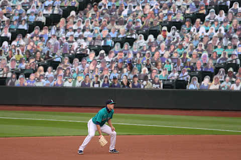 Evan White of the Seattle Mariners lines up for a play against the Athletics during their Opening Day game. (Photo by Abbie Parr/Getty Images)