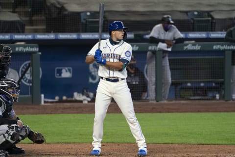 SEATTLE, WA – AUGUST 09: Evan White #12 of the Seattle Mariners waits for a pitch during an at-bat in a game against the Colorado Rockies at T-Mobile Park on August, 9, 2020 in Seattle, Washington. The Mariners won 5-3. (Photo by Stephen Brashear/Getty Images)