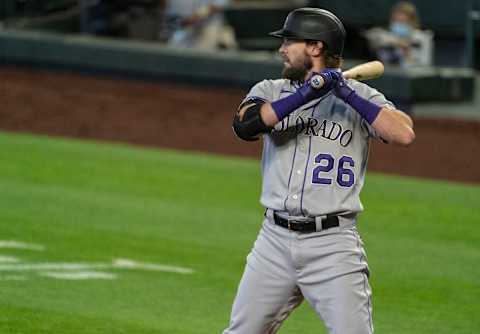 SEATTLE, WA – AUGUST 09: David Dahl of the Colorado Rockies waits for a pitch. The Seattle Mariners should pursue him. (Photo by Stephen Brashear/Getty Images)