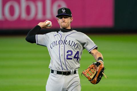 SEATTLE, WA – AUGUST 09: Ryan McMahon of the Colorado Rockies warms up before a game against the Seattle Mariners. (Photo by Stephen Brashear/Getty Images)