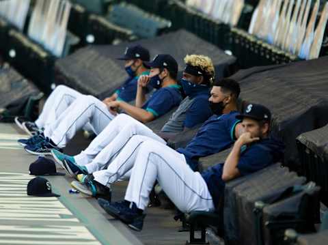 SEATTLE, WA – AUGUST 05: The Seattle Mariners pitchers, including Yusei Kikuchi and Justin Dunn sit above the dugout during the game. (Photo by Lindsey Wasson/Getty Images)