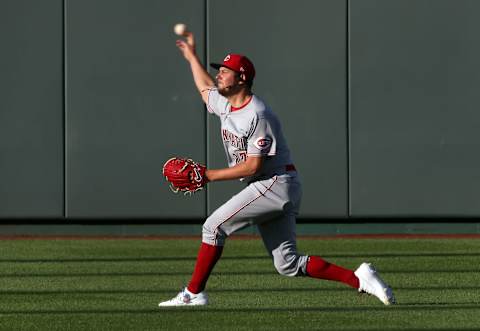 KANSAS CITY, MISSOURI – AUGUST 19: Trevor Bauer of the Cincinnati Reds warms up in the outfield prior to a game. (Photo by Jamie Squire/Getty Images)