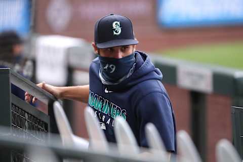 SEATTLE, WASHINGTON – AUGUST 19: Kendall Graveman of the Seattle Mariners looks on while taking a seat in the stands. (Photo by Abbie Parr/Getty Images)