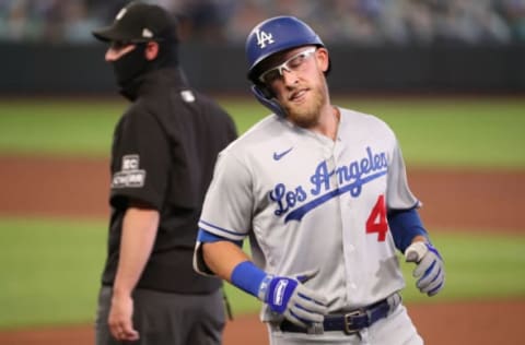 SEATTLE, WASHINGTON – AUGUST 20: Matt Beaty #45 of the Los Angeles Dodgers reacts after being unable to get on base in the fourth inning against the Seattle Mariners at T-Mobile Park on August 20, 2020 in Seattle, Washington. (Photo by Abbie Parr/Getty Images)