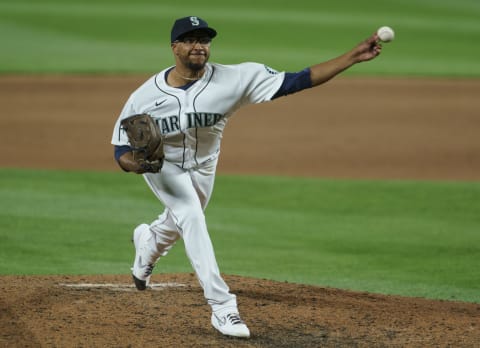 SEATTLE, WA – AUGUST 22: Reliever Aaron Fletcher of the Seattle Mariners delivers a pitch. (Photo by Stephen Brashear/Getty Images)