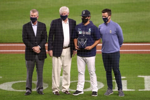 SEATTLE, WASHINGTON – SEPTEMBER 23: Seattle Mariners President Kevin Mather, majority owner John Stanton, Marco Gonzales, and GM Jerry Dipoto pose for a photo. (Photo by Abbie Parr/Getty Images)