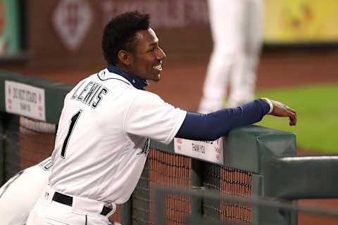 SEATTLE, WASHINGTON – SEPTEMBER 23: Kyle Lewis of the Seattle Mariners smiles in the dugout during a game. Avengers (Photo by Abbie Parr/Getty Images)