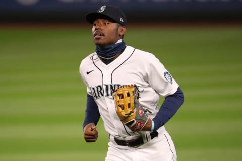 SEATTLE, WASHINGTON – SEPTEMBER 23: Kyle Lewis of the Seattle Mariners jogs off the field. (Photo by Abbie Parr/Getty Images)