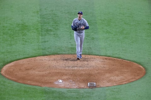 ARLINGTON, TEXAS – OCTOBER 21: Blake Snell #4 of the Tampa Bay Rays reacts against the Los Angeles Dodgers during the fifth inning in Game Two of the 2020 MLB World Series at Globe Life Field on October 21, 2020 in Arlington, Texas. (Photo by Ronald Martinez/Getty Images)