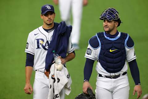 Charlie Morton #50 and former Mariner Mike Zunino #10 head toward the dugout prior to Game Three of the 2020 MLB World Series against the Los Angeles Dodgers at Globe Life Field on October 23, 2020 in Arlington, Texas. (Photo by Ronald Martinez/Getty Images)