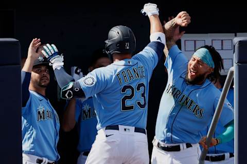 PEORIA, ARIZONA – MARCH 04: J.P. Crawford of the Seattle Mariners reacts after a home run by Ty France (Sodo Mojo). (Photo by Steph Chambers/Getty Images)