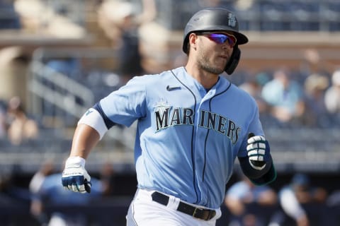 PEORIA, ARIZONA – MARCH 04: Ty France #23 of the Seattle Mariners scores a home run. (Photo by Steph Chambers/Getty Images)