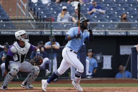 PEORIA, ARIZONA – MARCH 04: Taylor Trammell #20 of the Seattle Mariners bats against the Colorado Rockies. (Photo by Steph Chambers/Getty Images)