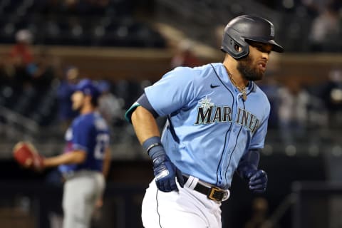 PEORIA, ARIZONA – MARCH 22: Jose Marmolejos of the Mariners rounds the bases on his home run against Trevor Bauer. (Photo by Abbie Parr/Getty Images)