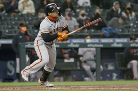 SEATTLE, WASHINGTON – APRIL 01: Donovan Solano #7 of the San Francisco Giants at bat against the Seattle Mariners in the fourth inning on Opening Day at T-Mobile Park on April 01, 2021 in Seattle, Washington. (Photo by Steph Chambers/Getty Images)