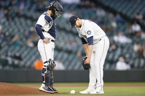 SEATTLE, WASHINGTON – APRIL 06: James Paxton #44 of the Seattle Mariners pauses for an injury in the game against the White Sox. (Photo by Steph Chambers/Getty Images)