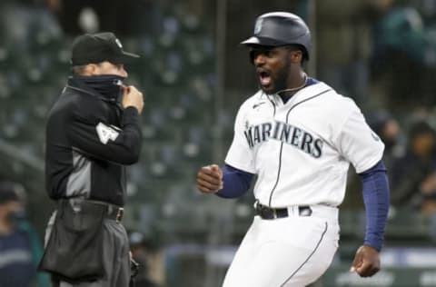 SEATTLE, WASHINGTON – APRIL 07: Taylor Trammell #20 of the Seattle Mariners scores against the Chicago White Sox. (Photo by Steph Chambers/Getty Images)