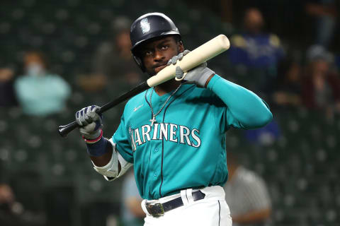 SEATTLE, WASHINGTON – APRIL 16: Taylor Trammell #20 of the Seattle Mariners reacts after striking out to end the sixth inning. (Photo by Abbie Parr/Getty Images)