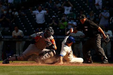 SEATTLE, WASHINGTON – APRIL 18: Tom Murphy #2 of the Seattle Mariners beats the tag by Jason Castro #18 of the Houston Astros. (Photo by Abbie Parr/Getty Images)