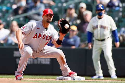 SEATTLE, WASHINGTON – MAY 02: Albert Pujols #5 of the Los Angeles Angels catches the ball for an out against the Seattle Mariners. (Photo by Steph Chambers/Getty Images)