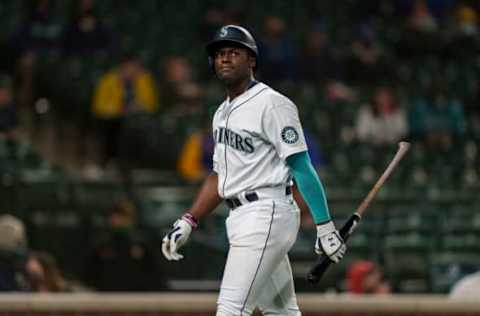 SEATTLE, WA – MAY 01: Taylor Trammell #20 of the Seattle Mariners walks off the field after an at-bat during game against the Los Angeles Angels at T-Mobile Park on May 1, 2021 in Seattle, Washington. The Angeles won 10-5. (Photo by Stephen Brashear/Getty Images)