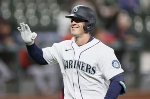 SEATTLE, WASHINGTON – MAY 13: Dylan Moore #25 of the Seattle Mariners reacts after his two-run home run. (Photo by Steph Chambers/Getty Images)