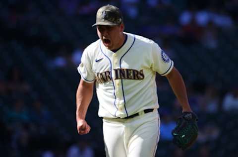 SEATTLE, WASHINGTON – MAY 16: Erik Swanson #50 of the Seattle Mariners reacts. (Photo by Abbie Parr/Getty Images)