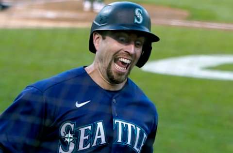 OAKLAND, CALIFORNIA – MAY 25: Tom Murphy #2 of the Seattle Mariners celebrates after scoring against the Oakland Athletics. (Photo by Thearon W. Henderson/Getty Images)