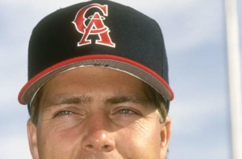 UNSPECIFIED – CIRCA 1994: Pitcher Mark Langston #12 of the California Angels looks on prior to the start of an Major League baseball game circa 1994. Langston played for the Angels from 1990-97. (Photo by Focus on Sport/Getty Images)