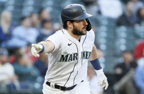 SEATTLE, WASHINGTON – JUNE 15: Luis Torrens #22 of the Seattle Mariners reacts after his single against the Minnesota Twins. (Photo by Steph Chambers/Getty Images)