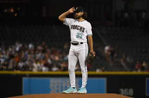 PHOENIX, ARIZONA – JUNE 22: Zac Gallen #23 of the Arizona Diamondbacks delivers a pitch against the Milwaukee Brewers at Chase Field on June 22, 2021 in Phoenix, Arizona. (Photo by Norm Hall/Getty Images)